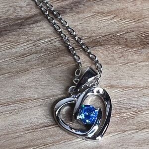 Elegant Silver Heart Necklace with Blue Gemstone